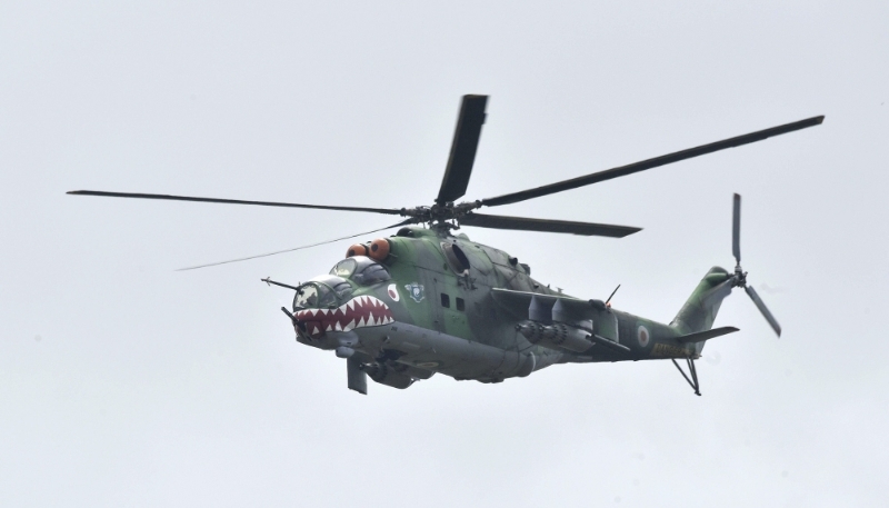 An Mi-24 helicopter during celebrations of the 64th anniversary of Ivory Coast's independence in Bassam on 7 August 2024.