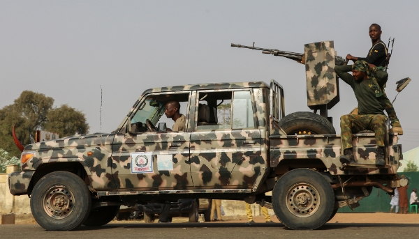 Security forces patrol in Jangebe, Zamfara State, 3 March 2021.