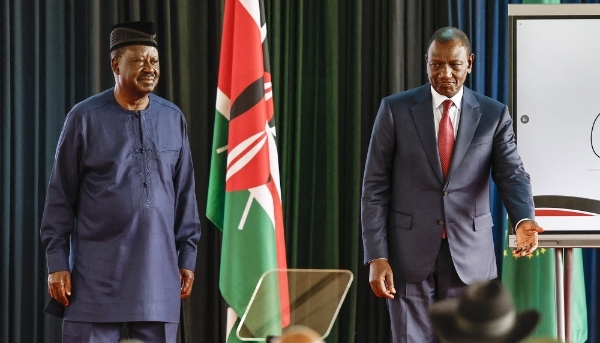 William Ruto (right) and Raila Odinga (left), the candidate for the chairperson of the African Union Commission at the Statehouse in Nairobi on 27 August 2024