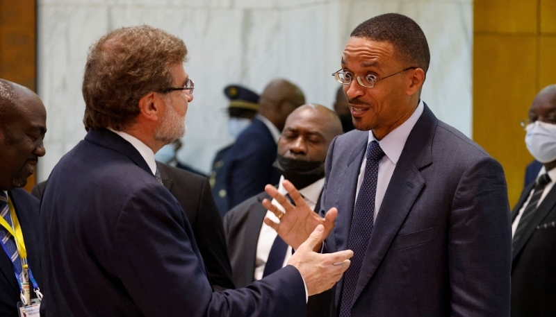 Franck Biya talks to a journalist during French President Emmanuel Macron's visit to Yaoundé, 26 July 2022.