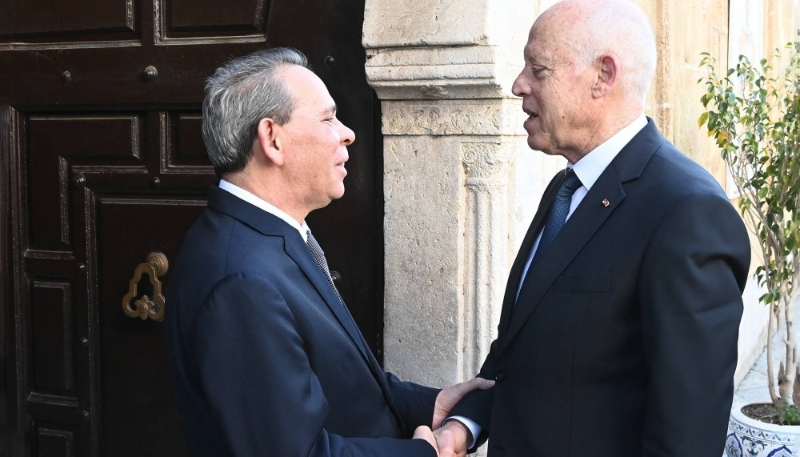 Tunisian President Kaïs Saïed meets with his PM Ahmed Hachani, in Tunis, 5 February 2024. 

