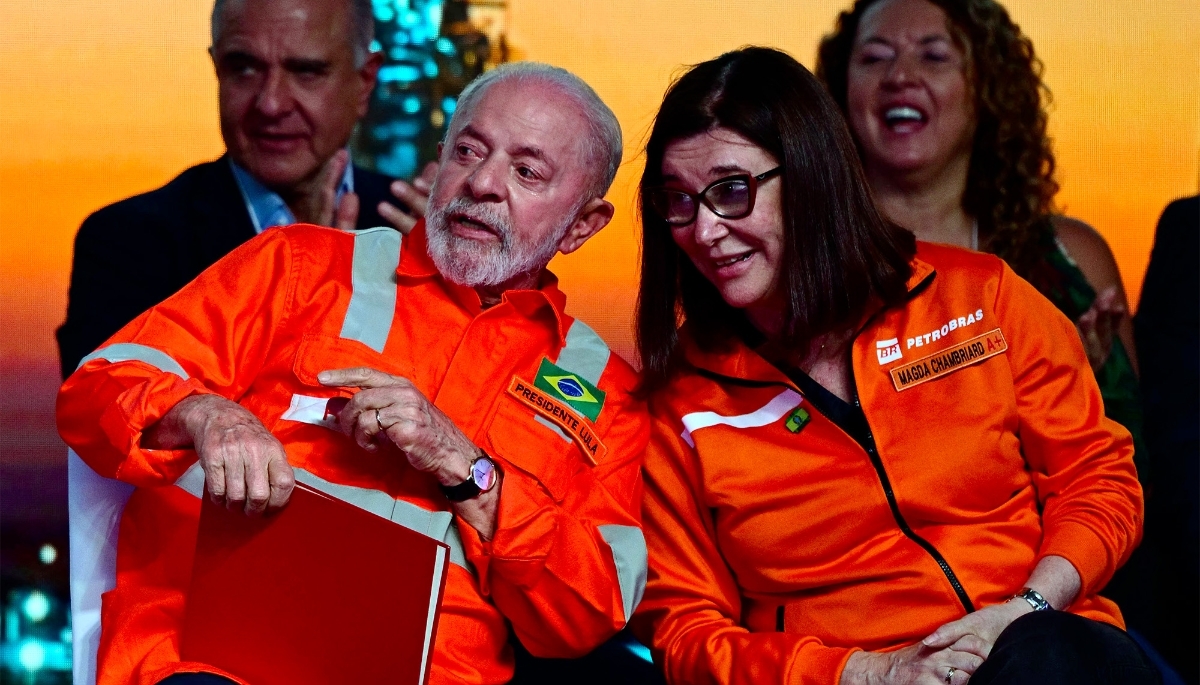 Brazil’s President Luiz Ignacio Lula da Silva talks to Petrobras President Magda Chambriard, in Rio de Janeiro State, Brazil, on 13 September 2024. 