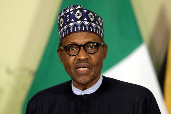 Nigerian President Muhammadu Buhari speaks during a news conference.