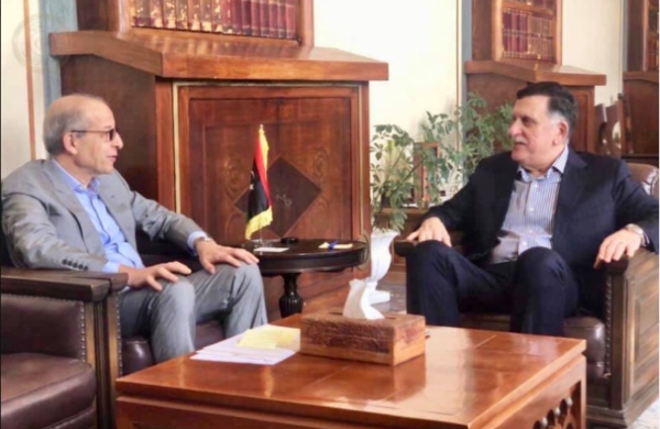 Prime Minister Fayez Sarraj (right) with the Central Bank of Libya governor Al Seddik Omar Al Kabir.